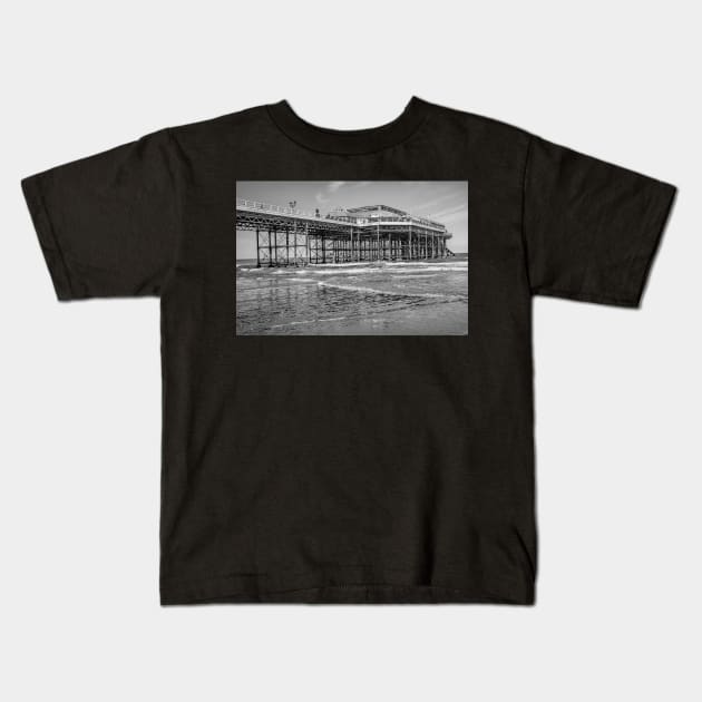 Side on view of the Victorian Cromer pier on the Norfolk coast Kids T-Shirt by yackers1